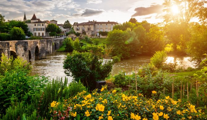 Medieval bridge and Barbaste village on background.