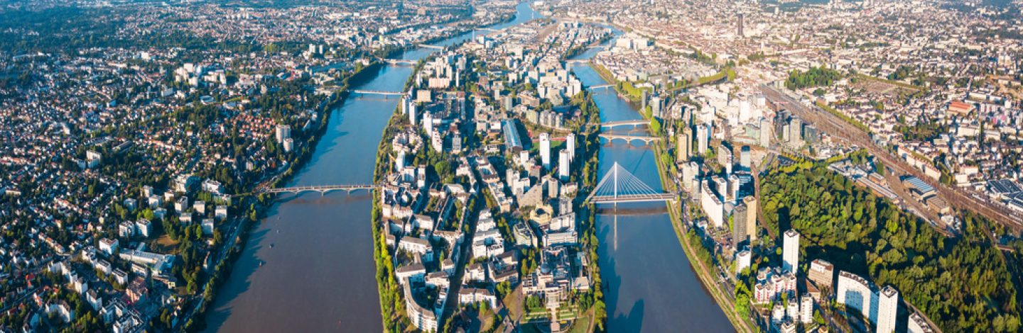 Nantes city between the branches of the Loire river aerial view in Loire-Atlantique region in France