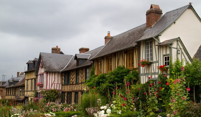 Le Bec-Hellouin, Haute-Normandie, typical timbered houses and lots of colourful flowers