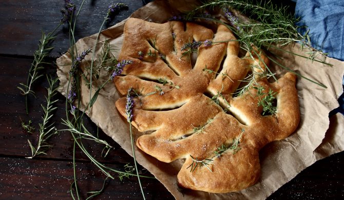 Fougasse, traditional french bread on wooden background