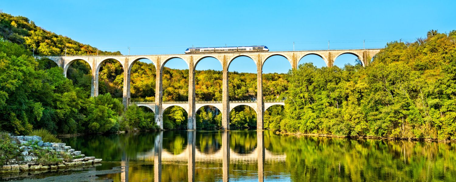 Regional train on the Cize-Bolozon viaduct across the Ain Gorge in France