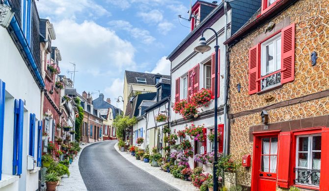 Saint-Valery-sur-Somme, France, August 15, 2020 - Beautiful flowered traditional street Saint-Valery-sur-Somme.